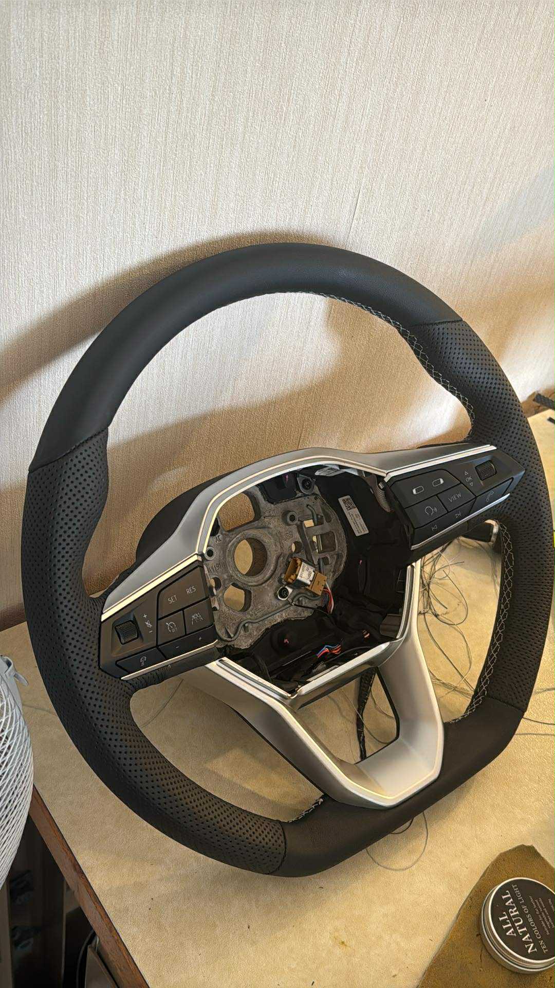 Kombinuotas vairo apsiuvimas